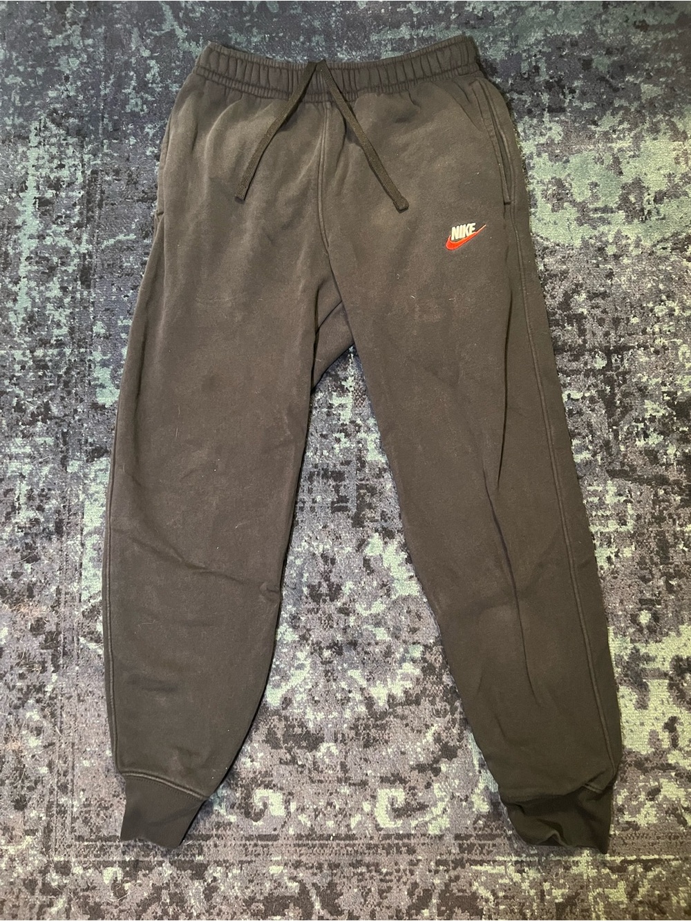 Nike Black Joggers with Red Swoosh Logo